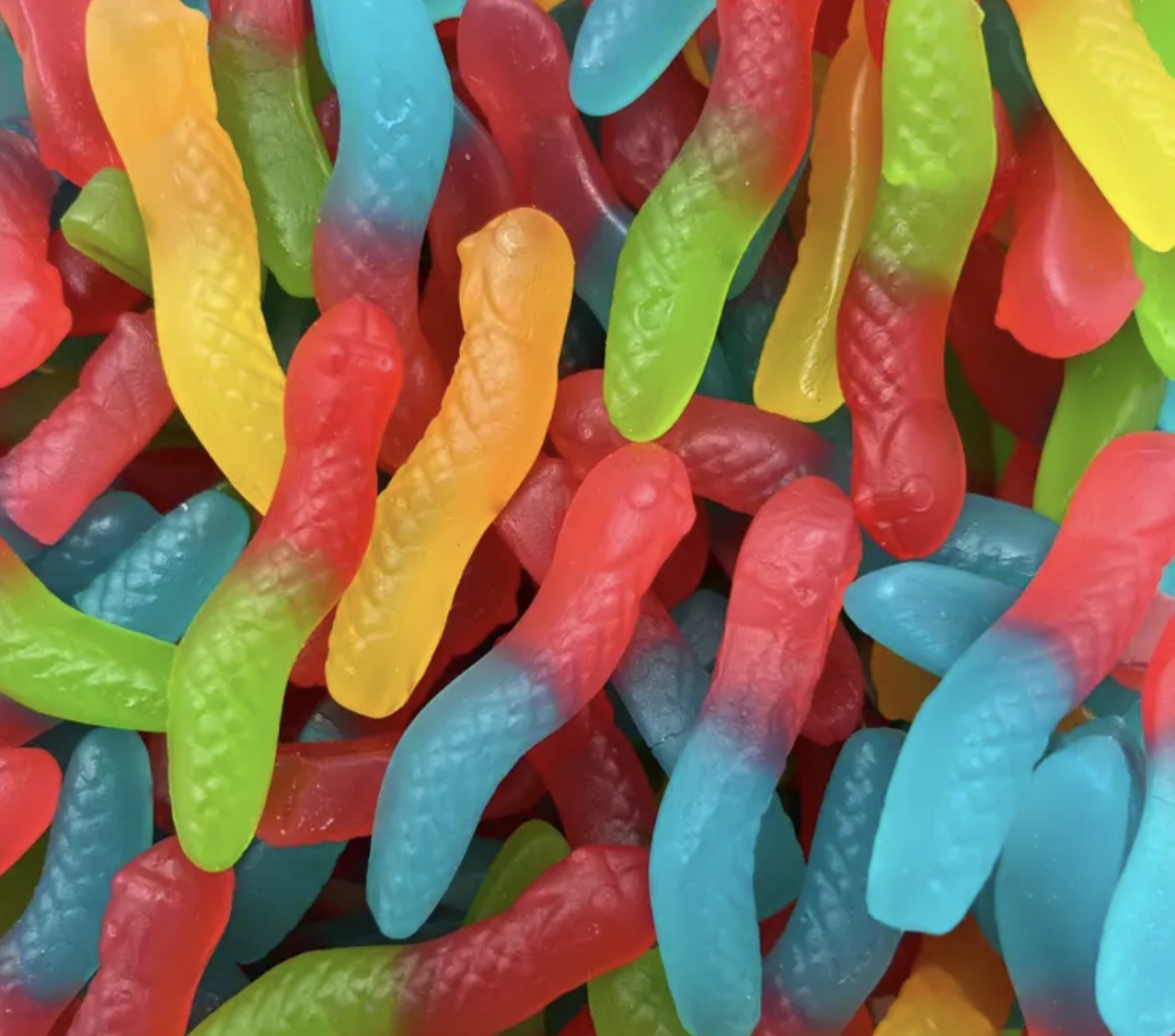 Vers Néons lisses Trolli  100g € 1,10